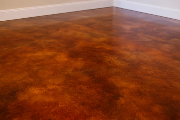 a red epoxy floor from TJ Concrete Contractor in Dallas, TX - Concrete footing services